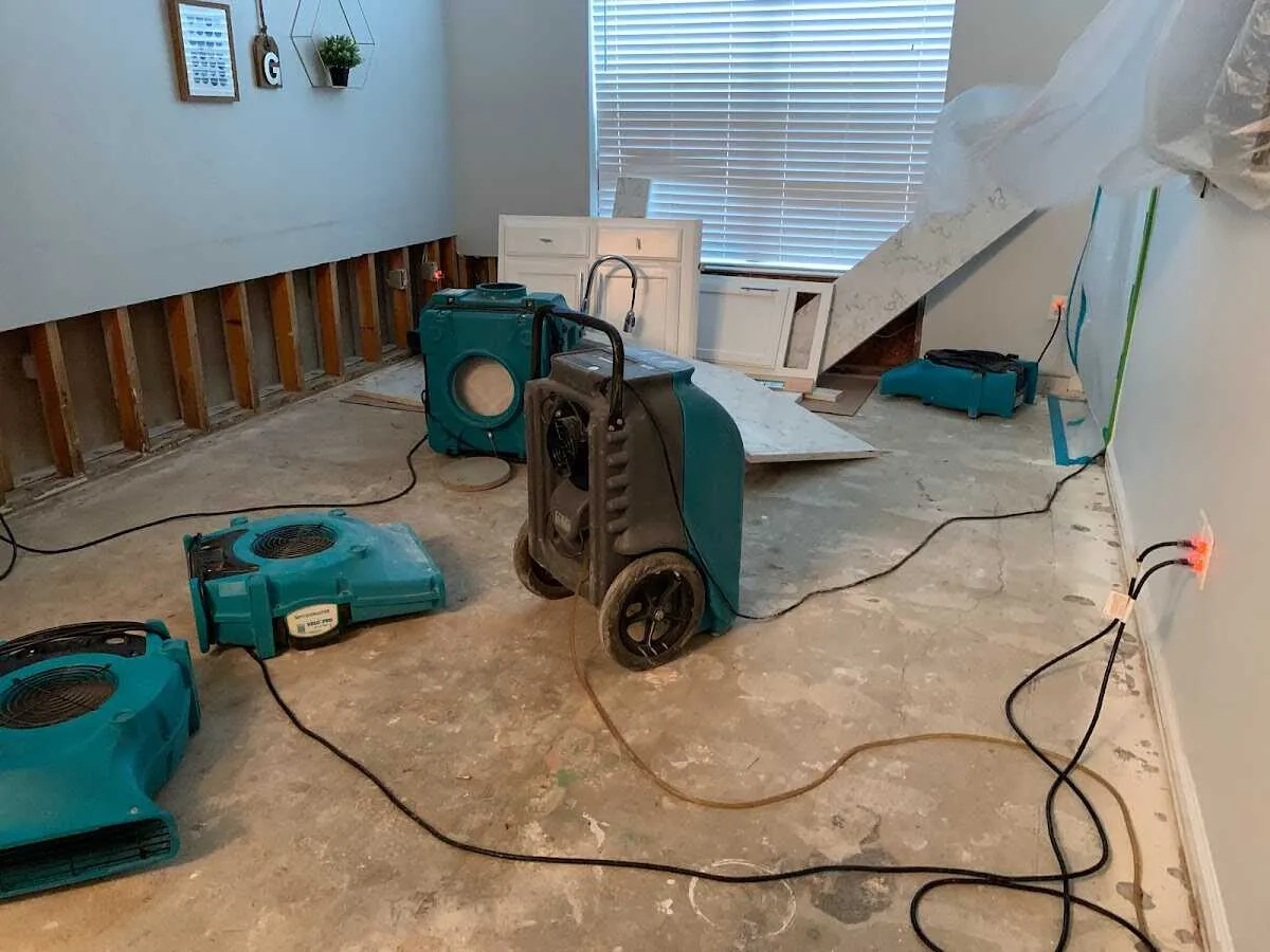 Dehumidifier in flood-cut room for Water Damage Restoration in Holdrege